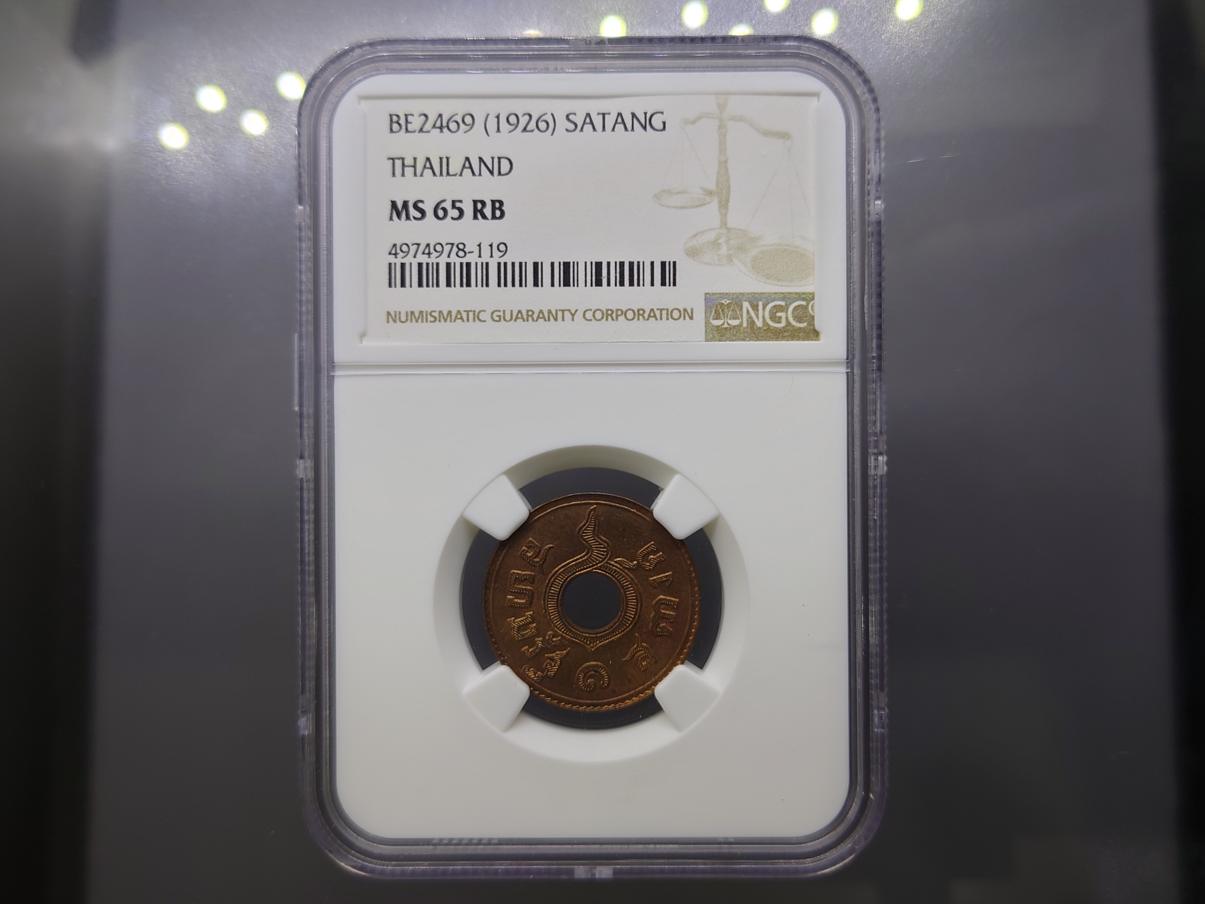 เหรียญเกรดดิ้ง 1 สตางค์ รู ทองแดง ปี 2469 MS 65 RB NGC