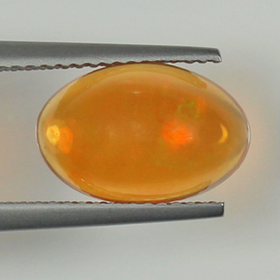 **ขายแล้ว**โอปอลไฟ (Fire Opal) จากเม็กซิโก 3.20 กะรัต สีส้มอมเหลือง มีเหลือบอ่อนๆ