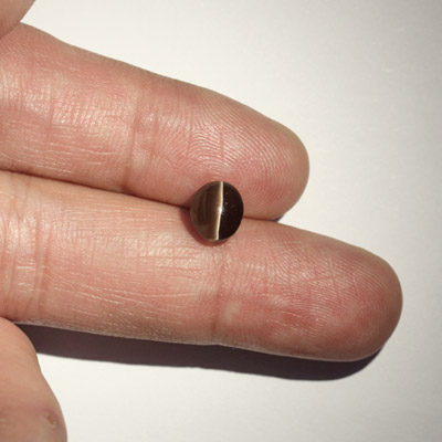 **ขายแล้ว**ซิลลิมาไนท์ตาแมว (Cat's eye Sillimanite) 2.54 กะรัต สีน้ำตาลเทา รูปไข่ ตาคม