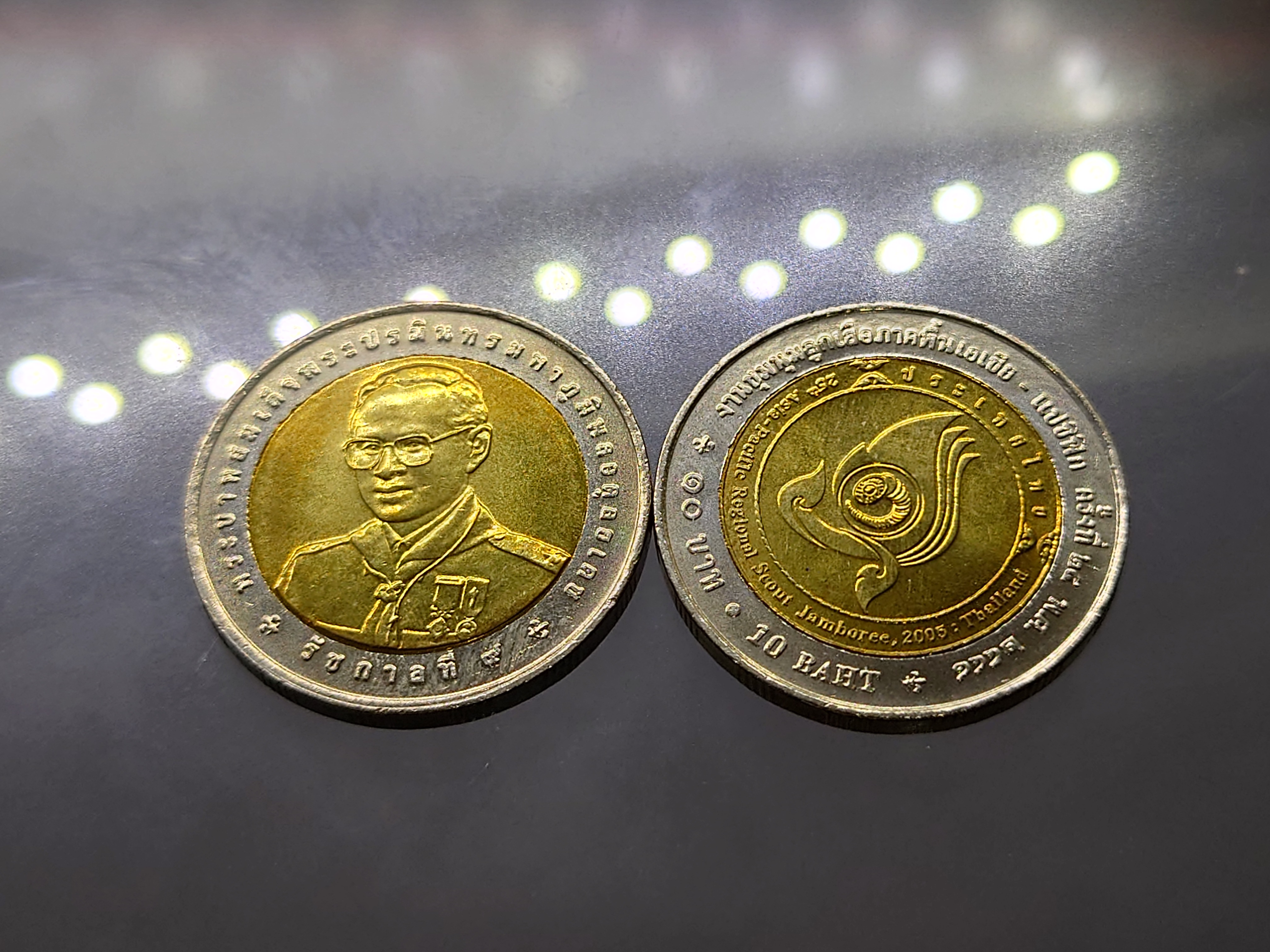 เหรียญยกถุง (100 เหรียญ) เหรียญ 10 บาท สองสี ที่ระลึกงานชุมนุมลูกเสือเอเซียแปซิฟิค ครั้งที่ 25 ปี 2549 ไม่ผ่านใช้