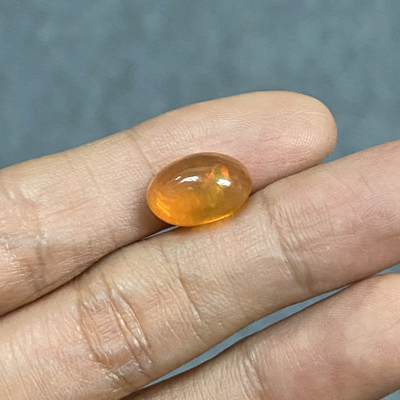 **ขายแล้ว**โอปอลไฟ (Fire Opal) จากเม็กซิโก 3.20 กะรัต สีส้มอมเหลือง มีเหลือบอ่อนๆ