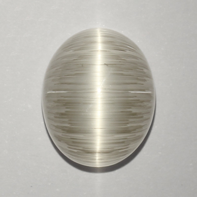**ขายแล้ว**โทปาสตาแมว (Cat's eye Topaz) 13.04 กะรัต ตาแมวไหมสีเงิน หายาก
