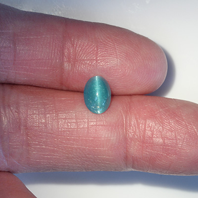 อะพาไทท์ตาแมว (Cat's eye Apatite) 1.67 กะรัต สีฟ้าอมเขียว
