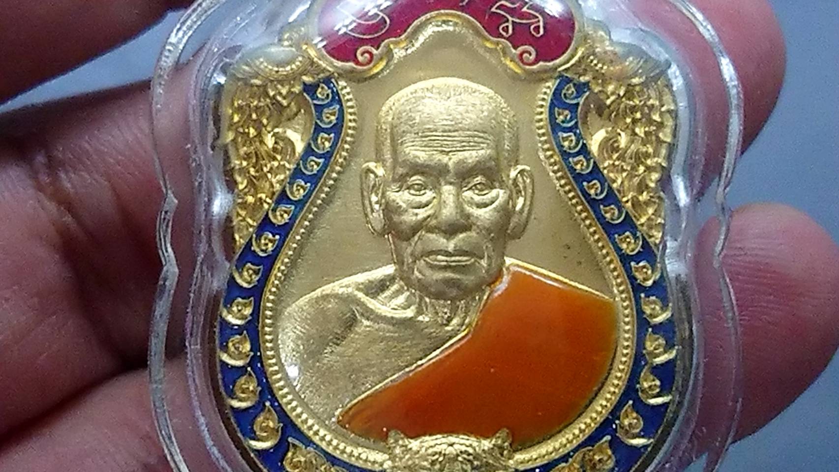 เหรียญเสมาเสือคาบดาบ รุ่น2 เนื้อทองทิพย์ ลงยาขอบน้ำเงิน ซุ้มแดง ลงยาจีวร หลวงพ่อพัฒน์ วัดห้วยด้วน โคท 115