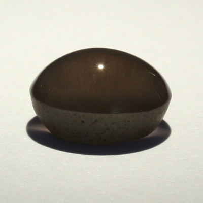 **ขายแล้ว**ซิลลิมาไนท์ตาแมว (Cat's eye Sillimanite) 5.49 กะรัต สีเทา รูปไข่ ตาคม