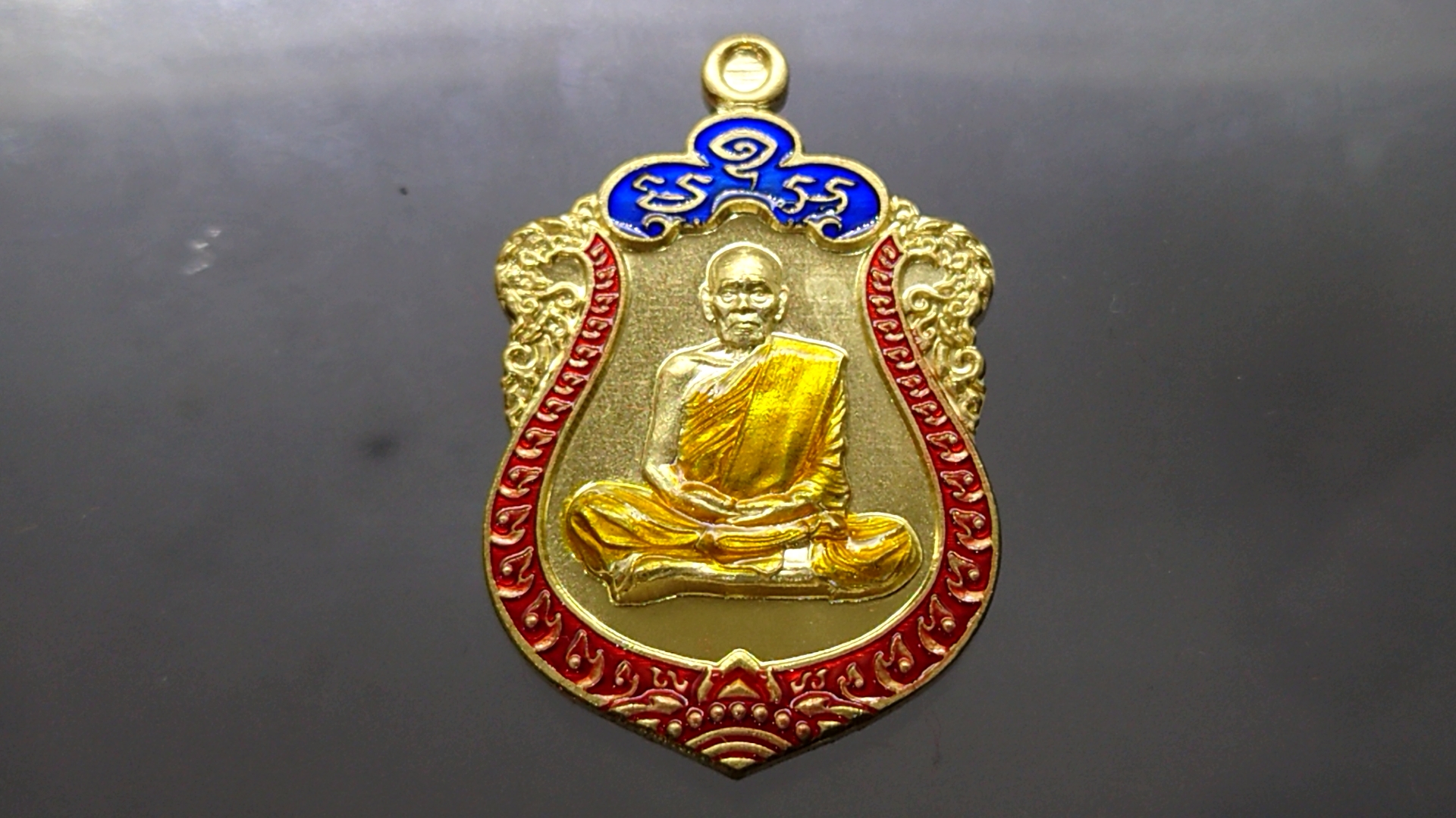 เหรียญมหาเศรษฐี 99 เนื้อทองทิพย์ ลงยาขอบแดง ซุ้มน้ำเงิน ลงยาจีวร (ป๋อง สุพรรณ) หลวงพ่อพัฒน์ วัดห้วยด้วน