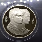 เหรียญนิเกิลขัดเงา 100 บาท การประชุมลูกเสือโลก ครั้งที่33 พร้อมกล่องหนังใบเซอร์