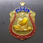 เหรียญมหาเศรษฐี 99 เนื้อทองทิพย์ ลงยาขอบแดง ซุ้มน้ำเงิน ลงยาจีวร (ป๋อง สุพรรณ) หลวงพ่อพัฒน์ วัดห้วยด้วน