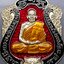 เสือคาบดาบรุ่น 4 เนื้ออัลปาก้าลงยาแดง ขอบดำ บนดำ ลงยาจีวร (พิมพ์เสือ1) หลวงพ่อพัฒน์ วัดห้วยด้วน โคท 216